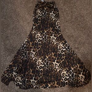 Never worn before Leopard Print skirt. Size medium.